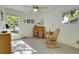 Charming bedroom featuring a rocking chair and vintage desk at 1618 S Kenton St, Aurora, CO 80012