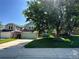 Charming two-story house with a green exterior and yard at 5812 S Jericho Way, Centennial, CO 80015