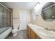Bathroom with double sinks, shower, and bathtub at 2203 S County Road 185, Byers, CO 80103
