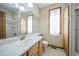 Bathroom with single sink, shower, and toilet at 2203 S County Road 185, Byers, CO 80103