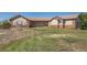 Ranch-style home with brick and siding exterior at 2203 S County Road 185, Byers, CO 80103