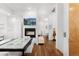 Bright dining area with hardwood floors and modern light fixtures at 35 S Ogden St, Denver, CO 80209