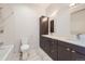 Bathroom with double vanity and a bathtub at 6008 Wadsworth Blvd # C, Arvada, CO 80003