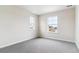 Bright bedroom with carpet flooring and large windows at 3822 N Elk St, Aurora, CO 80019