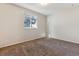 Simple carpeted bedroom with a window at 6572 S Dover St, Littleton, CO 80123