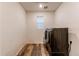 Laundry room with washer, dryer, and window at 10303 Pitkin Ct, Commerce City, CO 80022