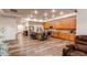 Open concept kitchen with island and views to living area at 10303 Pitkin Ct, Commerce City, CO 80022