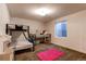Basement bedroom with a bunk bed and plenty of space for storage at 10303 Pitkin Ct, Commerce City, CO 80022