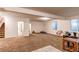 Spacious finished basement with room for recreation and storage at 10303 Pitkin Ct, Commerce City, CO 80022