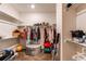 Large walk-in closet with ample shelving and hanging space at 10303 Pitkin Ct, Commerce City, CO 80022