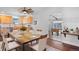 Kitchen with light wood cabinets, stainless steel appliances, and a dining area at 640 Pacific Ave, Fort Lupton, CO 80621