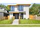 Modern two-story home with clean lines and landscaping at 4107 Bryant St, Denver, CO 80211