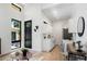 Modern kitchenette with white cabinets and stainless steel appliances at 4107 Bryant St, Denver, CO 80211