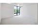 Bright bedroom with carpet and large window at 4107 Bryant St, Denver, CO 80211