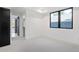 Spacious bedroom with carpet, large window and walk-in closet at 4107 Bryant St, Denver, CO 80211