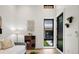 Bright living room with a window overlooking backyard at 4107 Bryant St, Denver, CO 80211