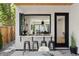 Backyard patio with an outdoor kitchen and pass-through window at 4107 Bryant St, Denver, CO 80211