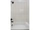 Simple bathroom with a shower/tub combo at 4107 Bryant St, Denver, CO 80211