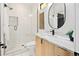 Modern bathroom with a large shower and a floating vanity at 4107 Bryant St, Denver, CO 80211