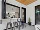 Outdoor kitchen with built-in bar and seating, perfect for entertaining at 4107 Bryant St, Denver, CO 80211