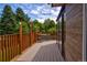 Private deck with table and chairs, perfect for outdoor dining at 6039 W Fair Dr, Littleton, CO 80123