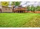 Spacious backyard with large deck and storage shed at 6039 W Fair Dr, Littleton, CO 80123