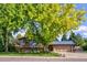 Charming ranch home with mature landscaping at 6039 W Fair Dr, Littleton, CO 80123