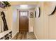 Inviting entryway with built-in storage and decorative accents at 6039 W Fair Dr, Littleton, CO 80123