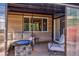 Relaxing outdoor patio with fire pit and comfortable seating at 6039 W Fair Dr, Littleton, CO 80123