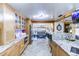 Modern kitchen with granite countertops and stainless steel appliances at 6039 W Fair Dr, Littleton, CO 80123