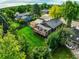 House and backyard aerial view, highlighting large green space at 6039 W Fair Dr, Littleton, CO 80123