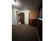 Bright bedroom featuring built-in cabinets and closet at 16032 E Floyd Ave, Aurora, CO 80013