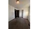 Simple bedroom with carpeted floor, window, and closet at 16032 E Floyd Ave, Aurora, CO 80013