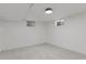 Unfinished basement with neutral carpet and plenty of storage at 34 University Dr, Longmont, CO 80503