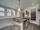 Modern kitchen with an island and subway tile backsplash at 13006 E 103Rd Ave, Commerce City, CO 80022