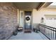 Inviting front entry with stone accents and a seasonal wreath at 2453 Reserve St, Erie, CO 80516