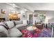 Cozy living room with sectional sofa, armchair, and red area rug at 654 County Road 672, Breckenridge, CO 80424