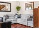 Spacious living room featuring a large sectional sofa and hardwood floors at 654 County Road 672, Breckenridge, CO 80424