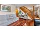 Open living area with hardwood floors and a cozy seating arrangement at 654 County Road 672, Breckenridge, CO 80424