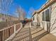 Backyard with deck and patio at 4680 Hopper Pl, Brighton, CO 80601