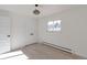 Bright bedroom with double door closet and wood floors at 824 W Geddes Cir, Littleton, CO 80120