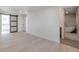 Main bedroom with barn door to laundry and ensuite bath at 824 W Geddes Cir, Littleton, CO 80120
