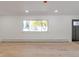 Bright living room with hardwood floors and large windows at 824 W Geddes Cir, Littleton, CO 80120