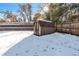 The backyard has a large shed for extra storage at 824 W Geddes Cir, Littleton, CO 80120