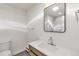 Clean bathroom with vanity, toilet and shower at 824 W Geddes Cir, Littleton, CO 80120