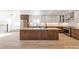 Modern kitchen with a large island and stainless steel appliances at 824 W Geddes Cir, Littleton, CO 80120