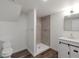 Basement bathroom with shower and vanity at 824 W Geddes Cir, Littleton, CO 80120