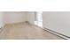 Finished basement with hardwood floors and sliding glass door at 824 W Geddes Cir, Littleton, CO 80120