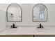 Modern bathroom with double vanity and updated fixtures at 824 W Geddes Cir, Littleton, CO 80120