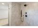 Large walk-in shower with modern tile and fixtures at 824 W Geddes Cir, Littleton, CO 80120